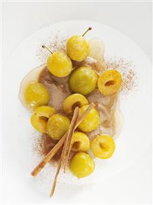 Carob cream with mirabelles and honey