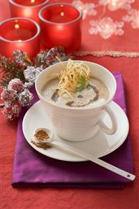Potato and plum foam soup with cinnamon