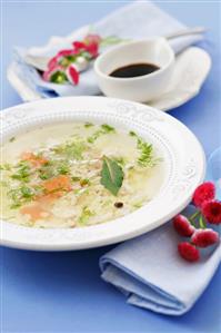 Chicken broth with stelline, carrot and dill