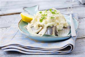 Herrings with apple, onion and sour cream