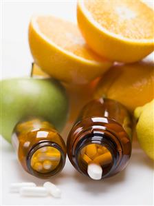 Tablets and fresh fruit