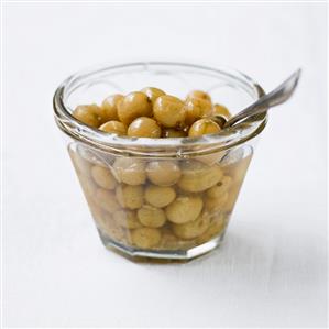 Bottled gooseberries in a glass jar