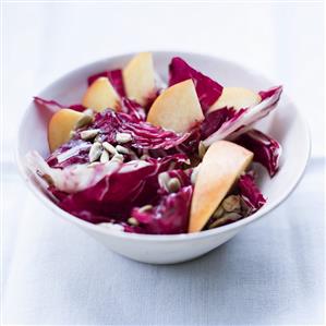 Radicchio and peach salad with sunflower seeds