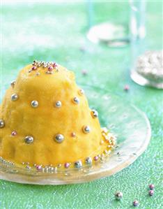 Peach ice cream bombe with silver dragées