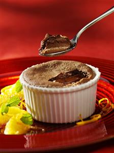 Chocolate soufflé with orange segments