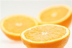 Three orange halves