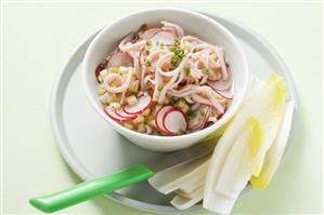 Apple and radish salad with cured pork