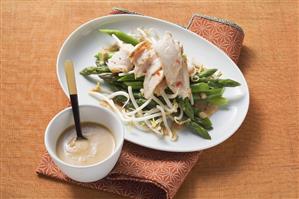 Green asparagus with orange sauce