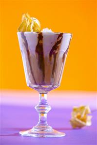 Glass of espresso with vanilla ice cream and chocolate syrup
