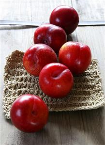 Six red plums