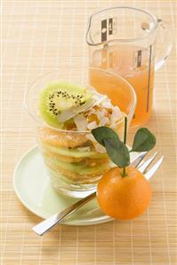 Mandarin oranges with kiwi fruit and coconut
