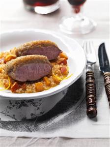 Duck breast with chestnut crust on barley with pumpkin & orange