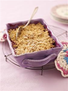Plum crumble in baking dish