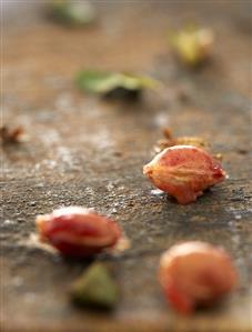 Cherry stones on old chopping board