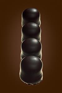 Four chocolate teacakes in a row