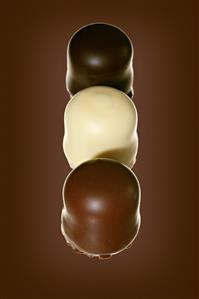 Three chocolate teacakes in a row