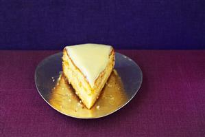 A piece of white Sachertorte (chocolate cake)