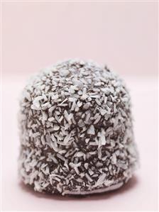 Chocolate teacake covered in grated coconut