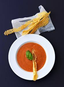 Cold tomato and pepper soup with cheese crisps