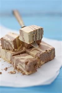 Chocolate halva, partly cut into cubes