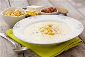Creamy cheese soup with croutons