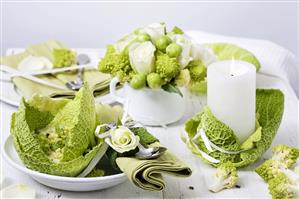 Romanesco soup on laid table with vegetable table decorations