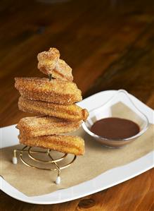 Cinnamon churros with chocolate sauce