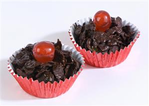Chocolate crispies with cocktail cherries