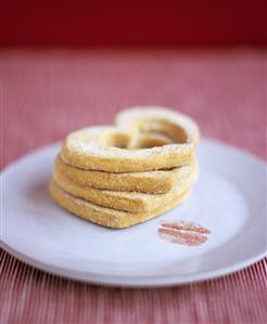 Heart-shaped biscuits and lipstick mark on plate