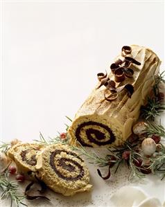 Partially Sliced Buche De Noelle; Christmas Log Cake