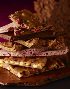Stack of Various Broken Chocolate Bars