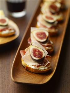 Fig Bruschetta on Wooden Platter